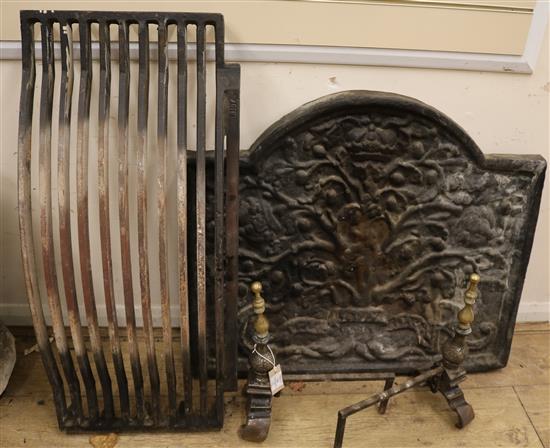 A cast iron fire back, basket and dogs basket W.90cm back W.84cm